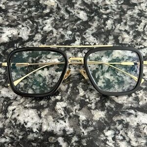 Readers. Black with gold trim. 1.5 strength.